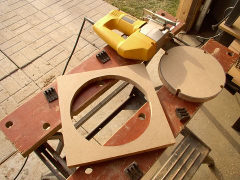 1986 Ford Bronco - Jigsaw the hole out a 1/4" bigger than the 8" midrange component speaker.