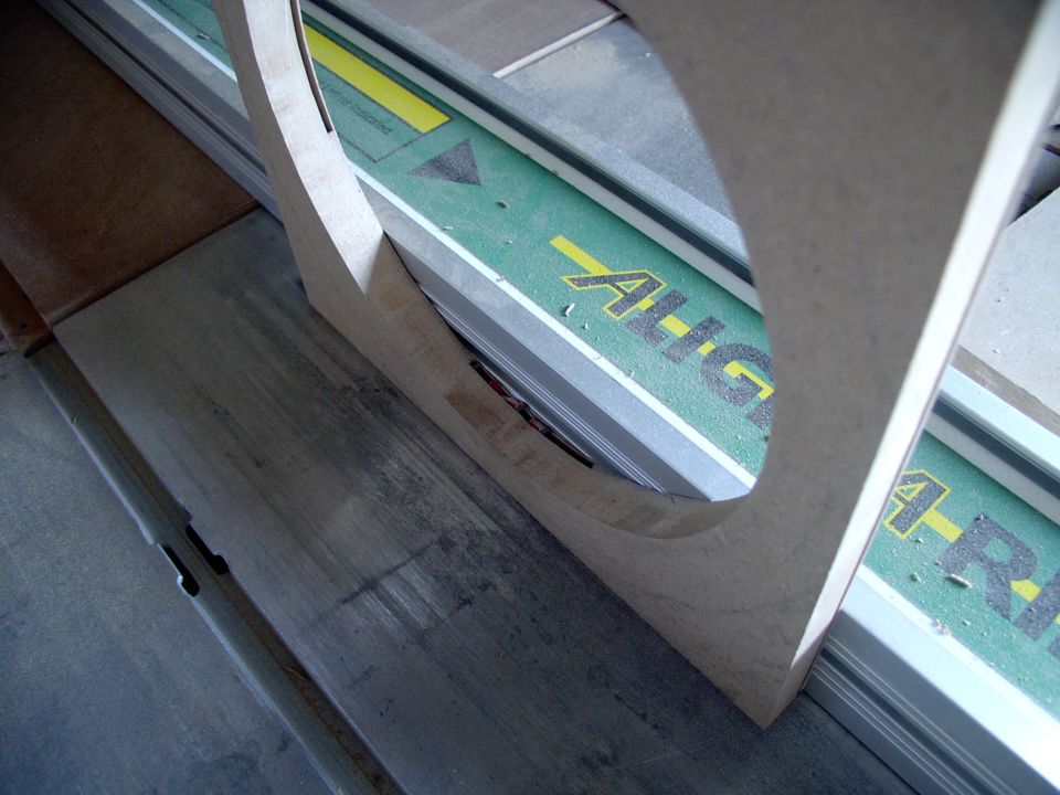 Set the table saw at the blade's width to shave off the majority of the covers backside material.