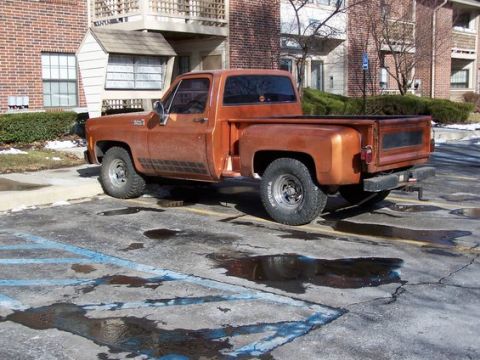 1979 Chevrolet C/K Pickup - This 1979 Chevrolet C/K Pickup truck is seen from a 3q-front angle in a parking lot.
