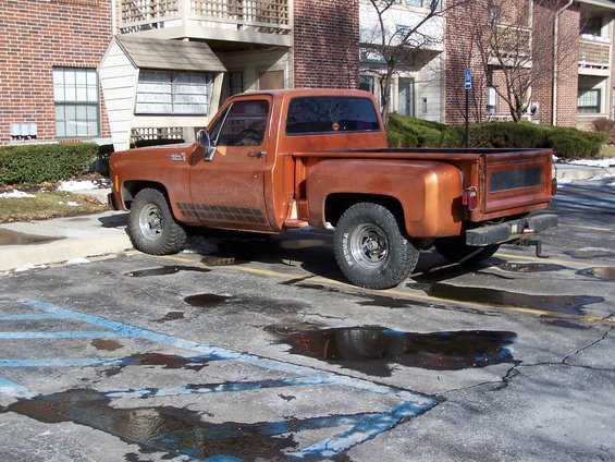 Orange 1979 Chevrolet C/K Pickup truck, 3q-front view