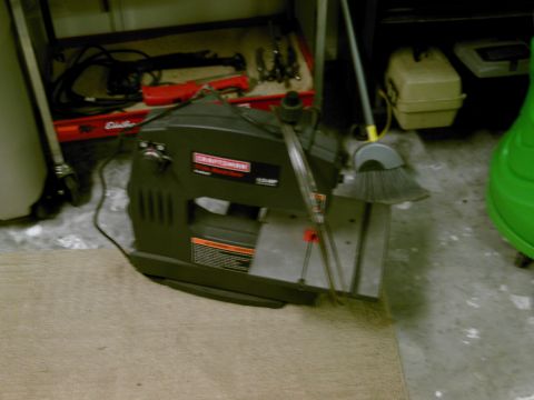 1986 Ford Bronco - A Craftsman planer is shown in a garage setting with tools and a broom nearby.