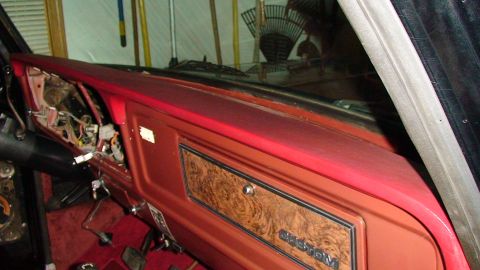 1979 Ford F-150 - Interior view of a 1979 Ford F-150 dashboard, showing the woodgrain trim and wiring.