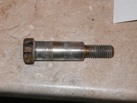 1993 Ford Bronco - A single metal bolt with a hex head and threaded shaft is shown against a speckled background.