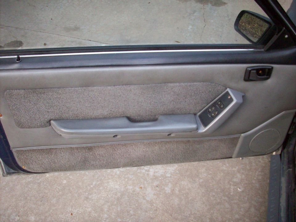 1989 Ford Mustang interior door panel with power window controls
