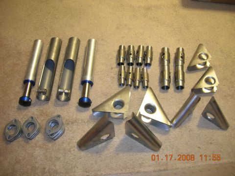 1996 Ford Bronco - Various metal components are laid out on a carpeted surface, with a timestamp visible in the lower right corner.