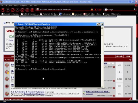 1993 Ford Bronco - A command prompt window shows traceroute results on a computer screen.