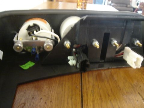 2000 Ford Crown Victoria - Close-up view of the back of a dashboard instrument cluster, showing wiring and mounting points.