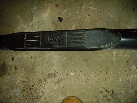 1991 Ford Bronco - A close-up view of a Westin brand running board, likely for an SUV or truck.