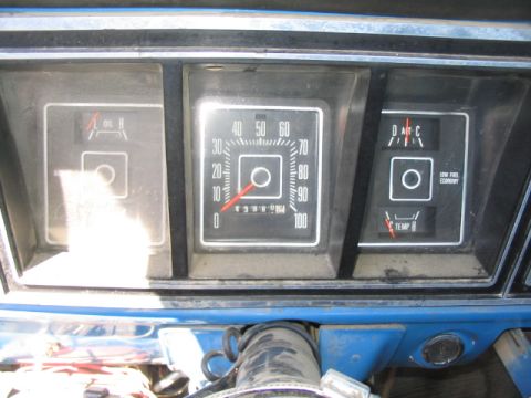 1979 Ford F-150 - The interior of a 1979 Ford F-150 shows a dashboard with multiple gauges and a steering column.