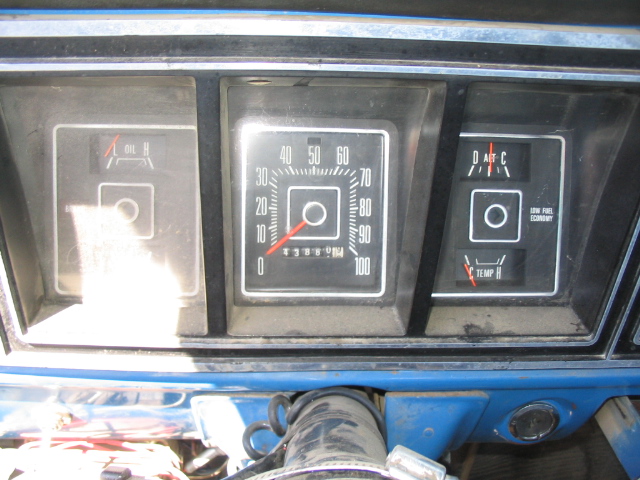 1979 Ford F-150 dashboard with speedometer, oil, and temperature gauges