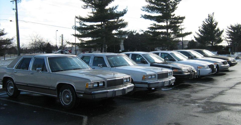 1988 Mercury Grand Marquis front view, tan sedan in line