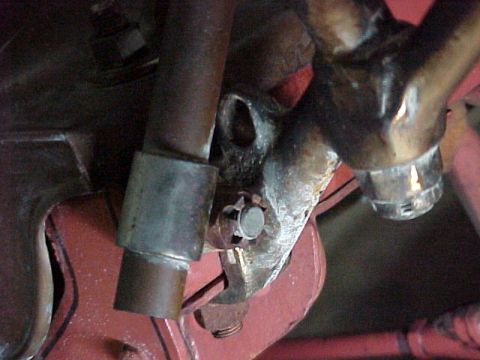 1912 Ford Model T - Headlight / fender bracket has loop for attaching the top straps