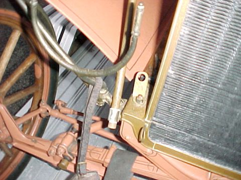 1912 Ford Model T - Somebody made these incorrect brackets to attach the top straps to the radiator mounting bolts. You can see the correct loops that are forg…