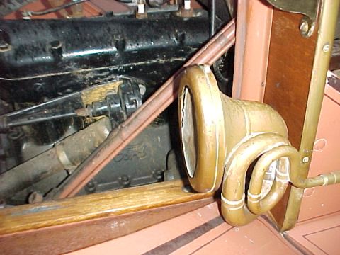 1912 Ford Model T - Nonpariel double twist horn and original horn tubing. Note: the water pump has been removed and discarded.