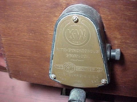 1912 Ford Model T - A close-up of a vintage KW Auto-Synchronous Spark Coil, indicating its manufacturer and origin.