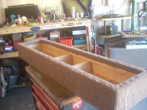 1992 Ford Bronco - A custom carpeted storage box is shown, likely for vehicle interior customization.