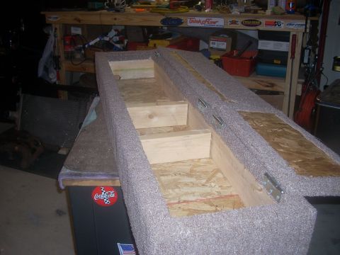 1992 Ford Bronco - A custom-built storage box with carpeted exterior and wooden interior dividers is shown.