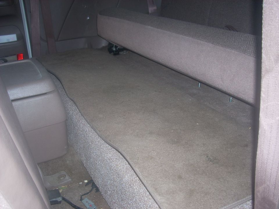 1992 Ford Bronco rear cargo area with seat folded down