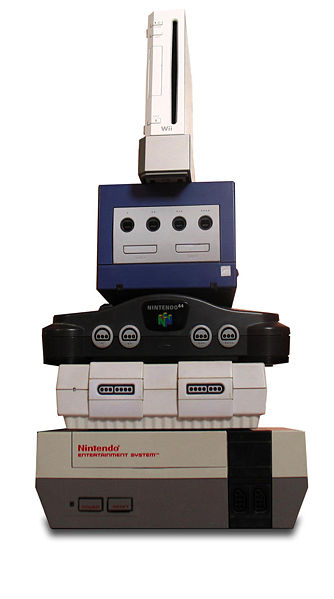 1988 Mercury Grand Marquis - A vertical arrangement of various Nintendo video game consoles, from newest to oldest.