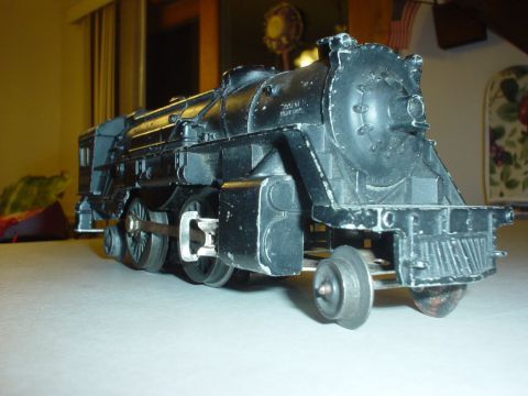 2000 Ford Crown Victoria - A close-up view of a black model train engine.