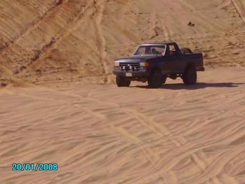 1990 Ford Bronco - Ford Bronco navigating sandy terrain in Glamis, California.