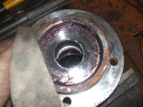 1995 Ford Bronco - This wheel bearing assembly appears to be in need of cleaning or replacement due to heavy grease and rust buildup.