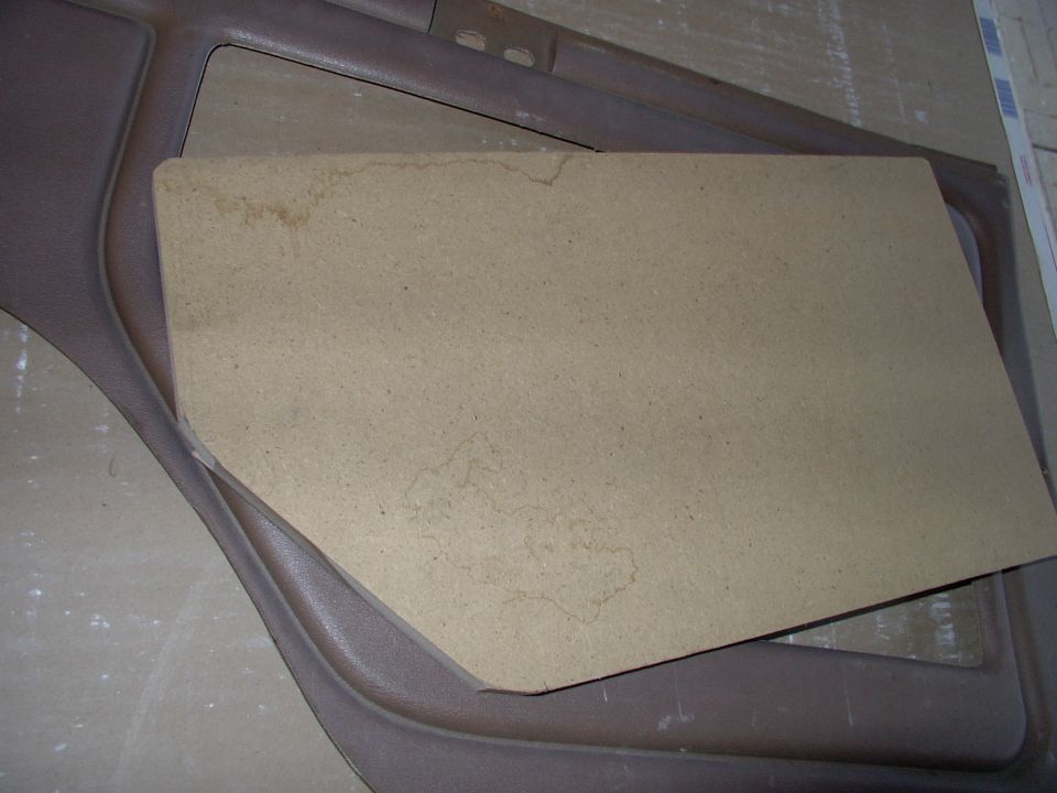 I cut it to fit just inside the fine Corinthian vinyl wall's cut out. If it's still slightly too large I'll trim the vinyl with a carpet knife later in the process.