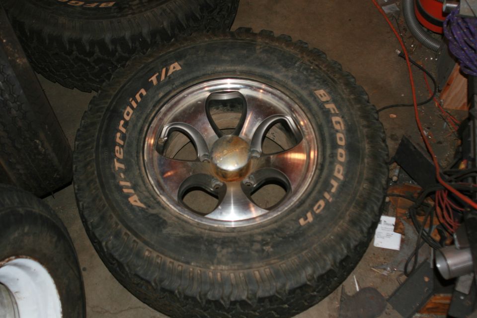 BFGoodrich All-Terrain T/A tire on a polished alloy wheel with center cap