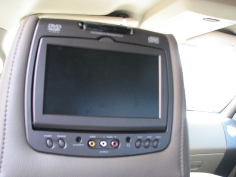 1991 Ford Bronco - Rear seat entertainment system with DVD player and audio/video input ports.
