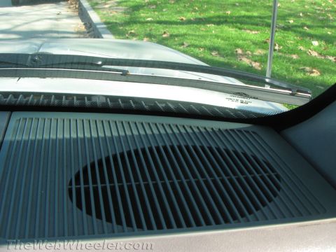 1994 Chevrolet Silverado 3500 - Interior view of a vehicle's dashboard speaker grille, showing a close-up of the speaker cover.