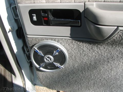 1994 Chevrolet Silverado 3500 - Aftermarket speaker installed in the interior door panel of a 1994 Chevrolet Silverado 3500.