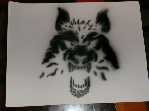 1995 Ford Probe - This is a stencil of a wolf's head, not a vehicle.