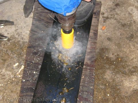 1987 Suzuki Samurai - Drilling a hole with a hole saw attachment on a power drill.