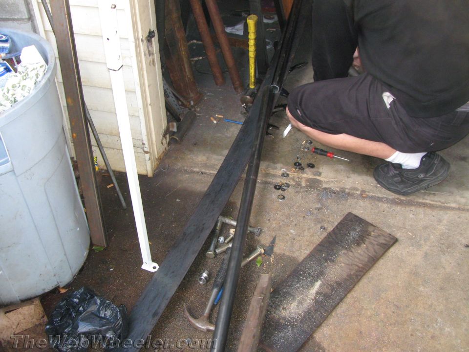 Black rock sliders and tools on concrete floor