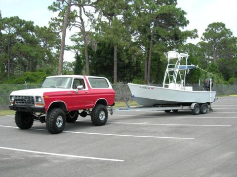 1978 Ford Bronco - This lifted 1978 Ford Bronco is ready for the water, towing a boat on a trailer.