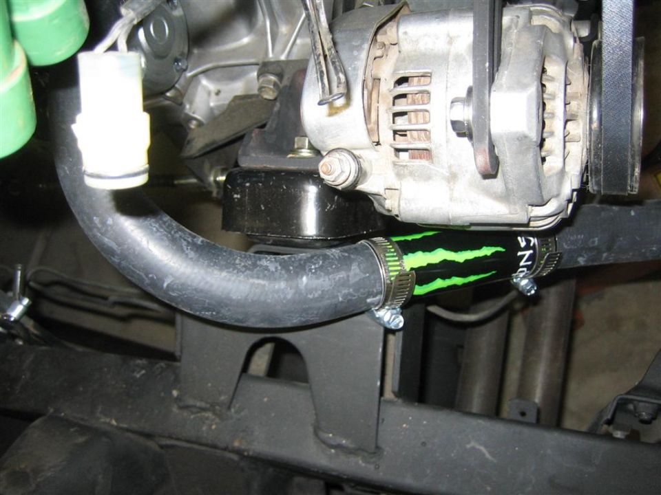 Engine hose with Monster Energy logo and Supermotors.net watermark