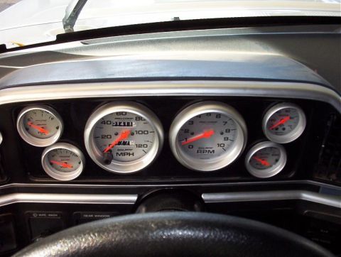 1986 Ford Bronco - Aftermarket gauges are installed in the dashboard of this vehicle.