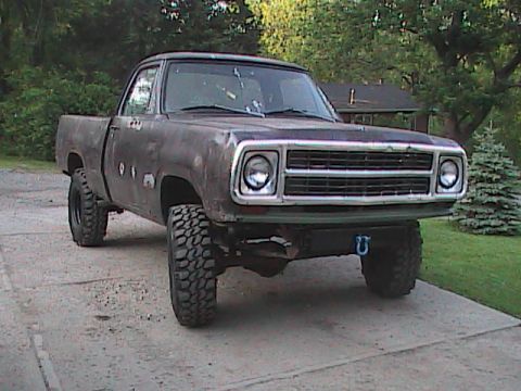 1980 Dodge Magnum - This lifted pickup truck appears to be from the early to mid-1970s, not a 1980 model.