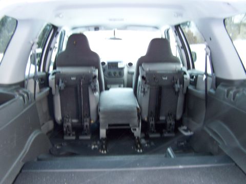 2004 Ford Expedition - Rear interior view of a 2004 Ford Expedition, highlighting the seating and cargo area.