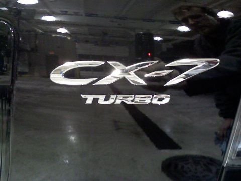 2007 Mazda CX-7 - The CX-7 TURBO badge is visible on the rear of the vehicle.