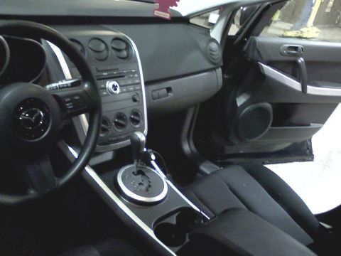 2007 Mazda CX-7 - Interior view of a 2007 Mazda CX-7, highlighting the center console and driver's side.