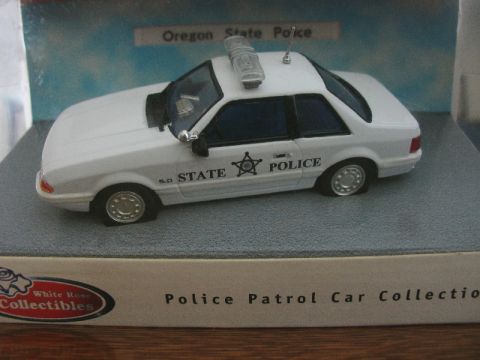 1993 Ford Mustang - White Rose Collectibles Police Patrol Car Collection model of a 1993 Ford Mustang.