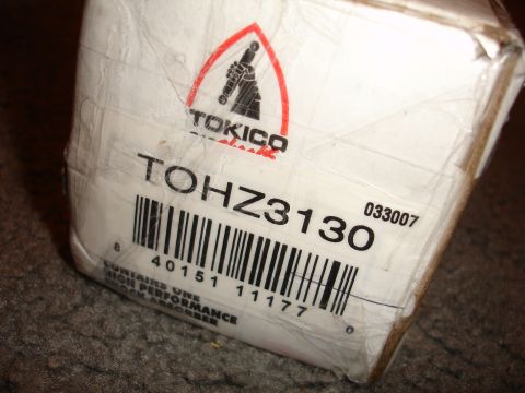1993 Ford Taurus - Box for a Tokico TOHZ3130 high-performance shock absorber, showing part number and barcode.