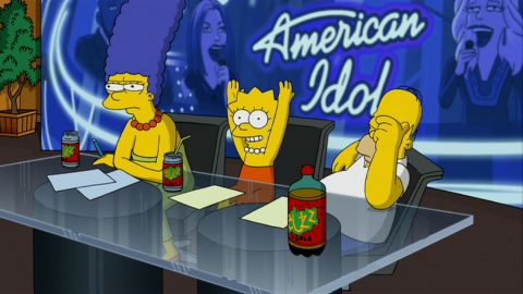 1988 Mercury Grand Marquis - This is a scene from The Simpsons where Marge, Bart, and Homer are judging an "American Idol" competition. They are sitting at a table with…