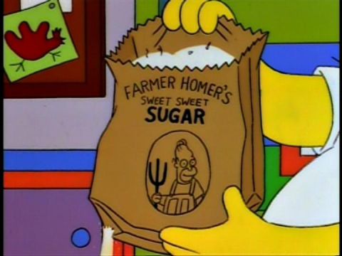 1988 Mercury Grand Marquis - A bag of sugar labeled 'Farmer Homer's Sweet Sweet Sugar' is held by a yellow-gloved hand.