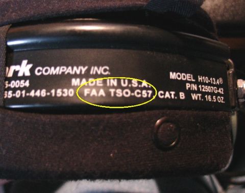 2003 Ford Crown Victoria - Close-up view of noise-cancelling headphones, detailing manufacturing information and model number.
