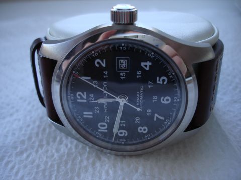1994 Ford Bronco - Close-up of a Hamilton Khaki Automatic watch, a black dial with Arabic numerals and a date window.