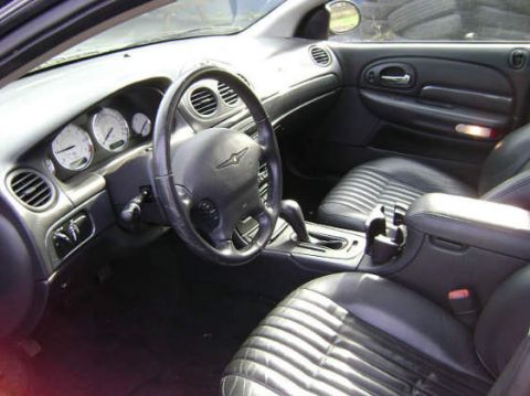 2002 Chrysler 300M - Interior view of a 2002 Chrysler 300M, highlighting the dashboard and seating.