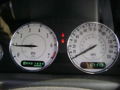 2002 Chrysler 300M - The vehicle's dashboard displays the speedometer, tachometer, and odometer reading.