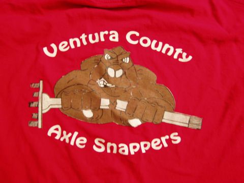 1967 Ford Bronco - This image shows a red t-shirt graphic a cartoon beaver character holding an axle, with text identifying 'Ventura County Axle Snappers'.